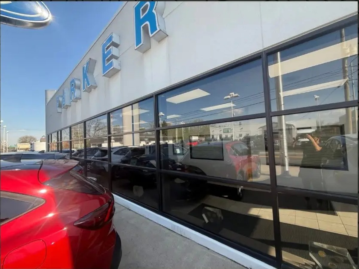 Commercial storefront window cleaning for a car dealership in Murray, KY